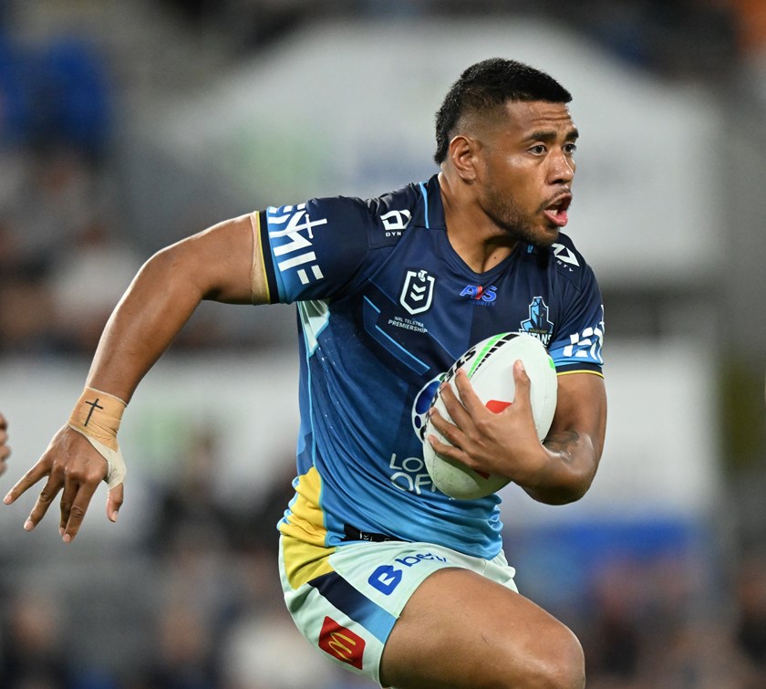 Moe Fotuaika takes the ball up for the Titans.