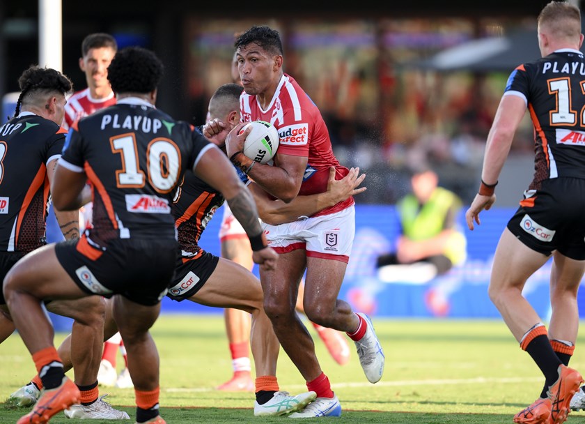 Daniel Saifiti runs the ball for the Dolphins against Wests Tigers.