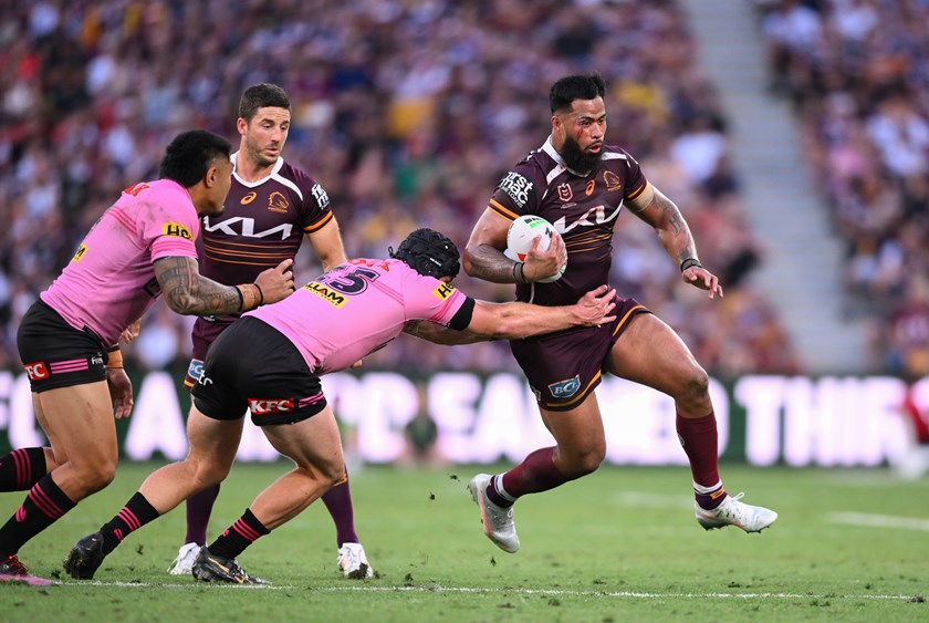 Payne Haas with the ball for the Broncos.