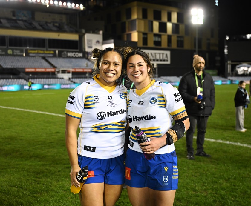 Mataele (left) pictured with Reuben Cherrington following her NRLW debut in Round 1. 