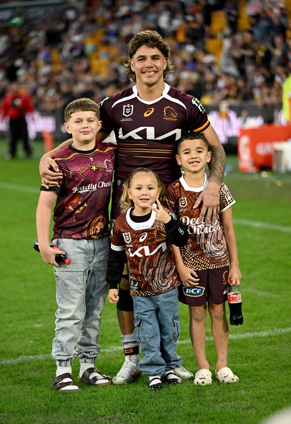 Reece Walsh with family, including daughter Leila.