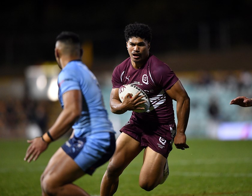 Rob Toia with the ball for the Queensland Under 19 side in 2022.