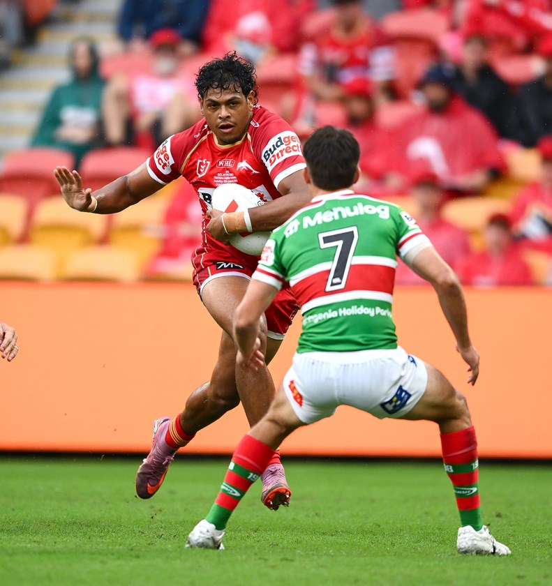 Selwyn Cobbo with the ball for the Dolphins in the match against the Rabbitohs.