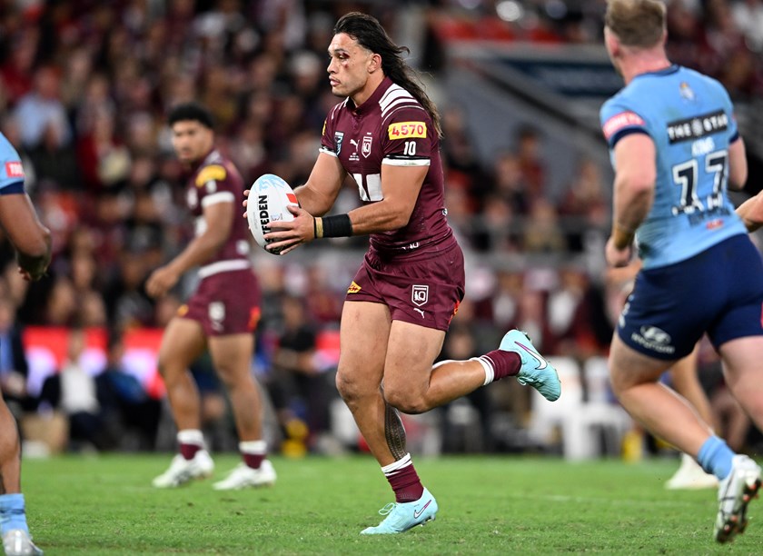Tino Fa'asuamaleaui runs the ball for the Maroons.