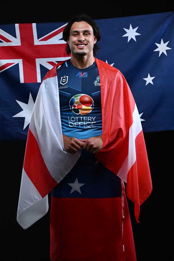 Tino Fa'asuamaleaui with the flags of his multiple heritages.