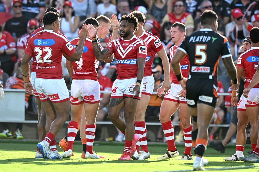Hamiso Tabuai-Fidow and Kulikefu Finefeuiaki celebrate with the Dolphins.