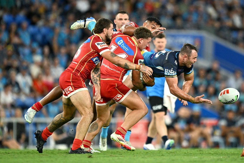 Jaimin Jolliffe with an offload for the Titans against the Dolphins.