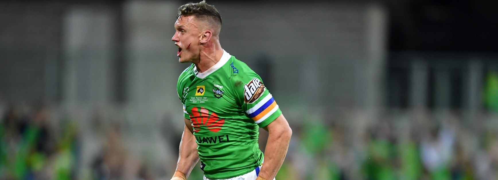 Jack Wighton celebrates a try.