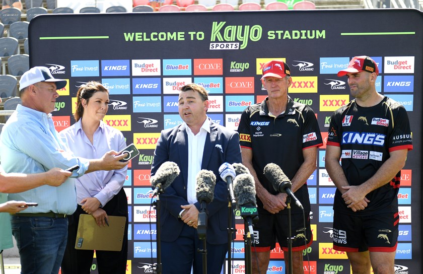Dolphins CEO Terry Reader makes a media announcement with Bennett and prop Mark Nichols