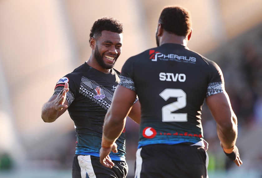 Semi Valemei and Maika Sivo celebrate Fiji's impressive win over Italy.