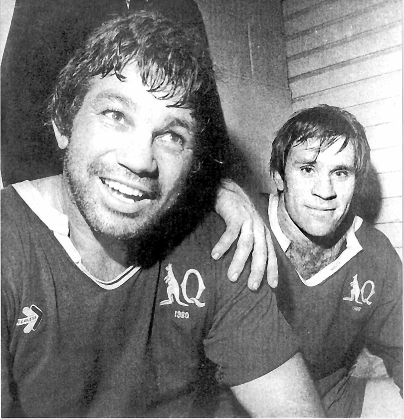 Arthur Beetson and John Lang celebrate Queensland's historic 20-10 win in the first State of Origin at Lang Park in 1980.
