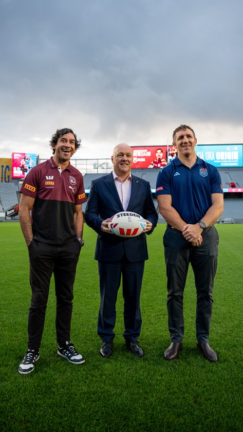 Origin greats Johnathan Thurston and Ryan Hoffman with New Zealand Prime Minister Christopher Luxon at the announcement that Eden Park would host a match in the 2027 series.